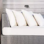 cozy outdoor patio with cushions and blankets