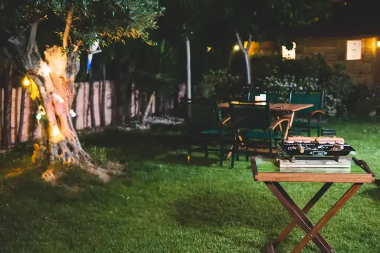 cozy summer garden sweden outdoor lights plants seating