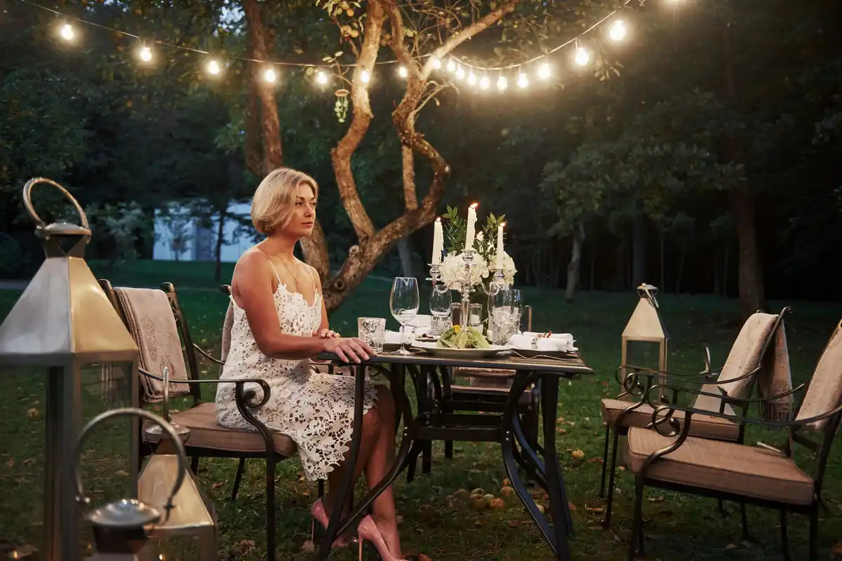cozy Scandinavian outdoor patio garden plants lighting furniture